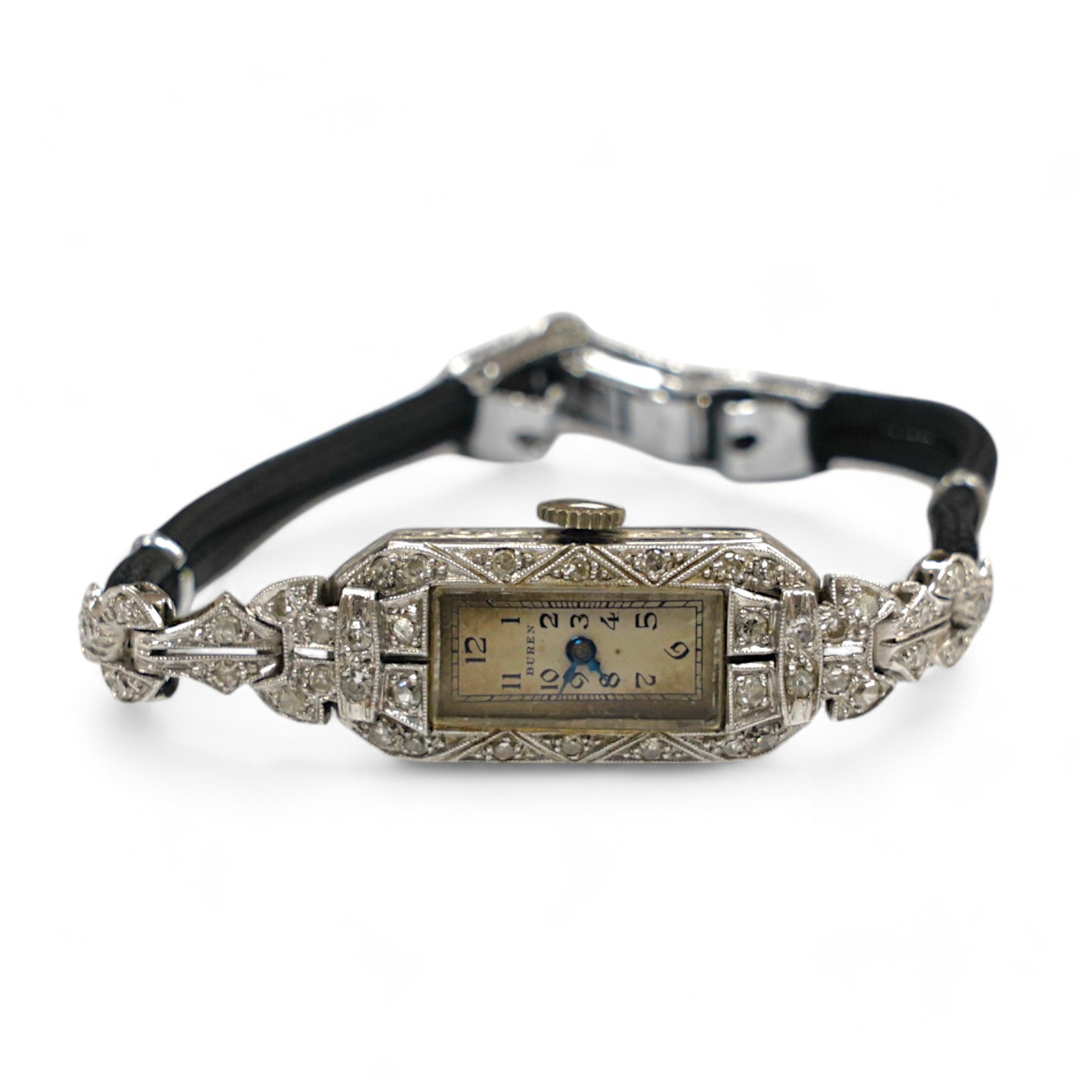 A lady's mid 20th century Buren white metal (stamped platinum) and diamond cluster set manual wind cocktail watch, on a twin fabric strap, gross weight 15.3 grams. Condition - poor to fair